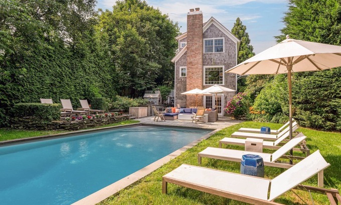 Water Mill Casa | Elegant Coastal Escape with Expansive Yard, Heated Pool, and Outdoor...