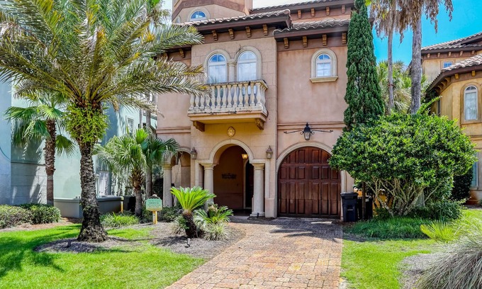 St. Tropez Casa | Elegant coastal villa with spacious patio, pool, hot tub, free WiFi & central AC