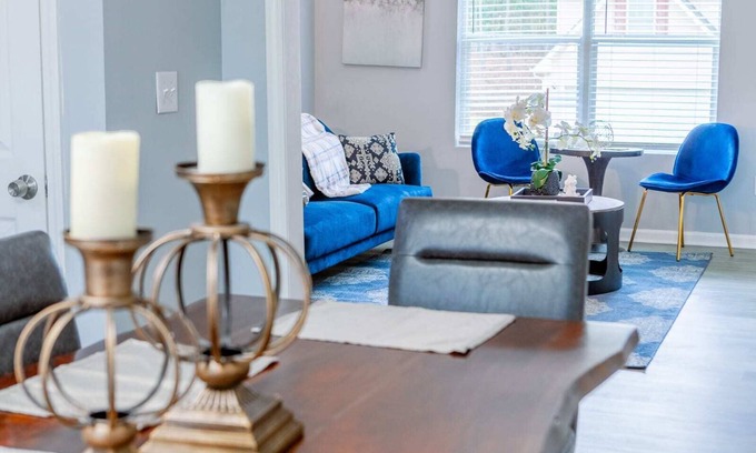 Fairburn Casa | Elegant Haven: Stylish Interiors with Serene Deck Views and Modern Comforts
