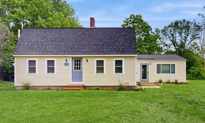 Wiscasset Casa | Elegant home with a cozy living area, Wifi, backyard, and washer/dryer