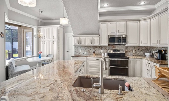 Nichols Casa | Elegant home with office, theater and heated pool