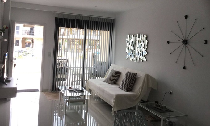 Pueblo Latino Apartamento | Playa Elisa Bay aplicación 411