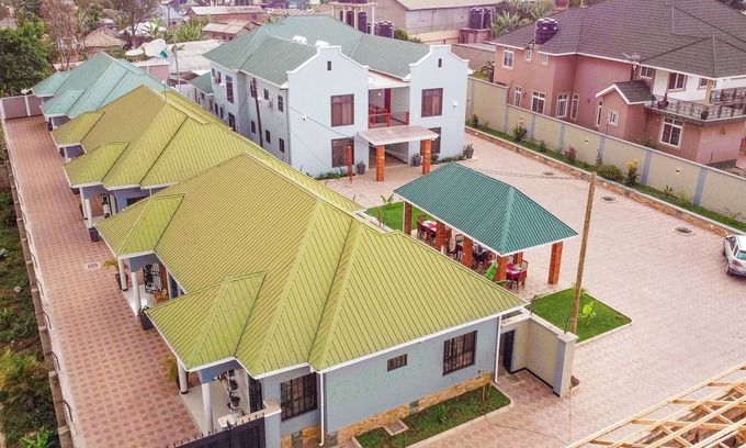 Arusha Apartamento | "Embrace Arusha's charm at Medan Hotel & Apartment: Your Ideal Stay!"
