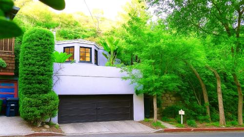 Hollywood Hills West Casa | Enchanting Gated Hollywood Hills Oasis with Tranquil Treet-Top Views, Outdoor Living Room and Patios, Magical Zen Garden, Plus Bonus Romantic Guest House and Free Garage in LA's Most Desirable Central Serene Area, Sleeps 8-10