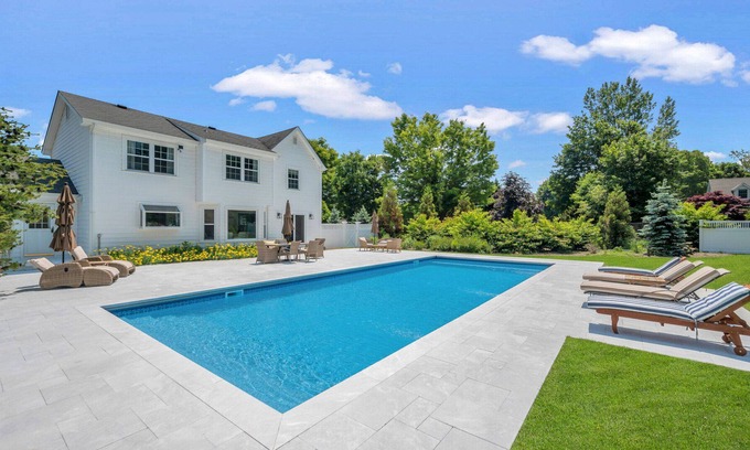 Southold Casa | Enchanting home with large backyard, stunning pool, expansive patio, and...