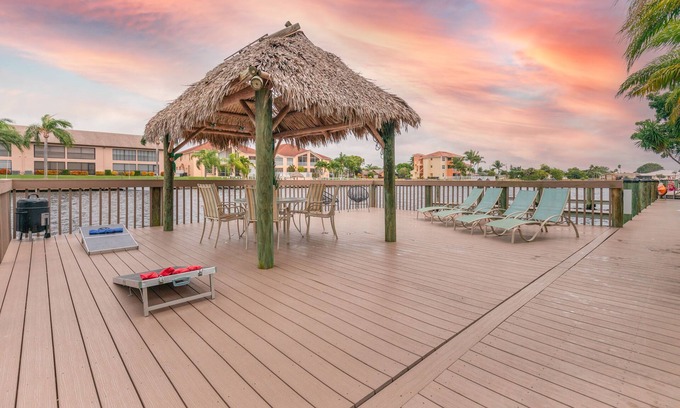 Caloosahatchee Villa | Enchanting tropical waterfront villa with boat slip, bikes, kayaks heated pool!