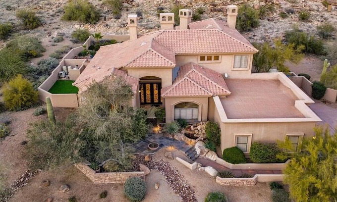 Mountain Park Ranch Casa | Enjoy breathtaking views of the mountainside throughout this hillside estate.