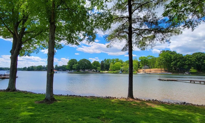 Troutman Casa | Enjoy the beauty of lake life in this waterfront home .