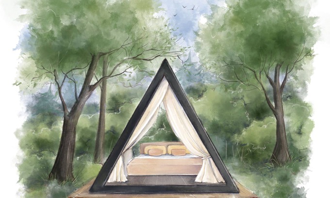 Fennville Alquiler De RV | Enjoy the simplicity and elegance of a cozy bedroom in the woods.