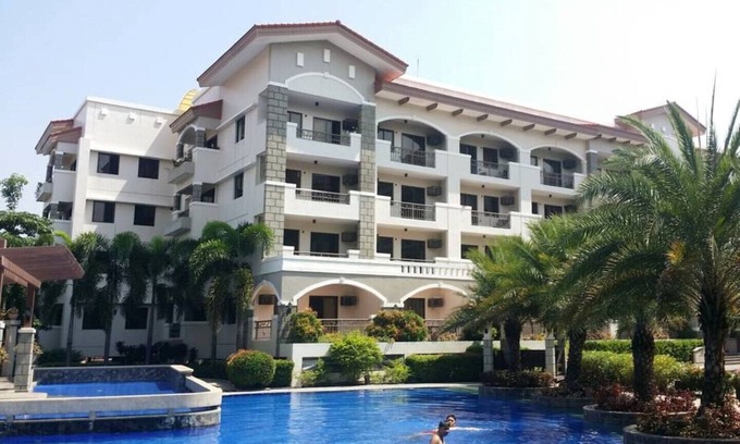 Las Pinas Condominio | Disfruta de tu estadía en Manila en este elegante condominio totalmente amueblado con WiFi de fibra
