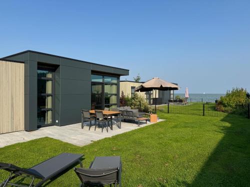 Enkhuizen Casa | Enkhuizer Strand Chalet Möwennest Zweite Reihe Haus Nr 261
