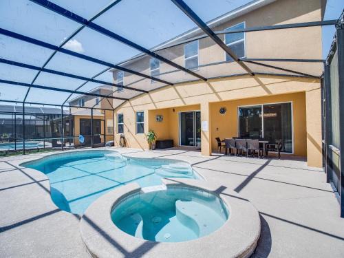 Watersong Casa | Epic 6-Bedroom Escape - Private Theater, Game Room, Pool, Spa & Themed Fun in Resort-Style Comfort