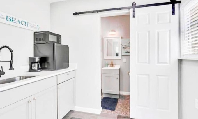 Jacksonville Beach Casa | Escape to the ultimate beach vacation at The Palm Tree Bliss Beach Bungalow!