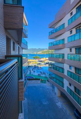 Praia Grande Casa | Espaçoso Apto 2 Quartos com PISCINA, VISTA MAR e Churrasqueira- PERFEITO PARA FAMÍLIA na PRAIA DOS ANJOS RESIDENCE CLUB