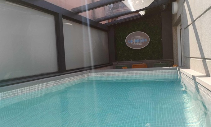 Vilagarcía de Arousa Condominio | Espectacular ático con piscina en el centro