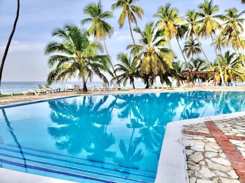 Juan Dolio Apartamento | Estancia Nana Tu Refugio con Vista al Mar, Piscina, wifi, lavadora secadora Reserva Ahora