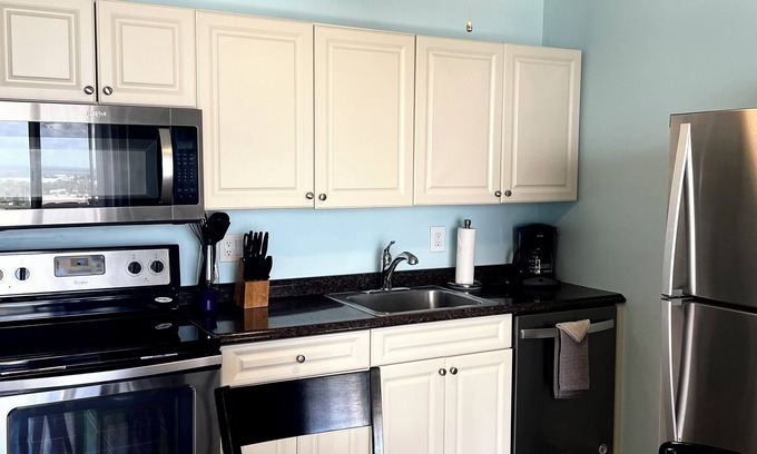 South Island Condominio | Estero Beach & Tennis Club by Check In Vacation Rentals