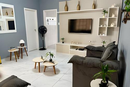Gonzaga Apartamento | Estilo e Conforto no Gonzaga – Uma Joia em Santos!
