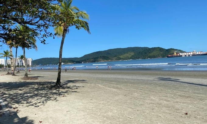 Gonzaga Apartamento | Excellent apartment, right on the sand, in front of Praia do Gonzaga in Santos,