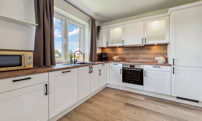 Hage Casa | Exclusive, modern new-build semi-detached house with garden for up to 8 people
