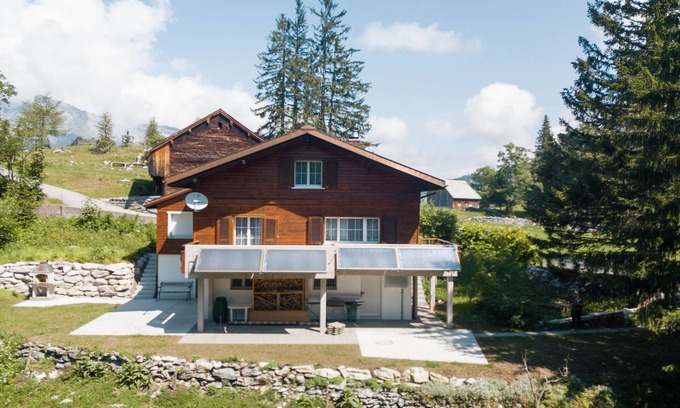 Amden Casa | "Experience Alpine Bliss: Family-Friendly Chalet with Stunning Views!"