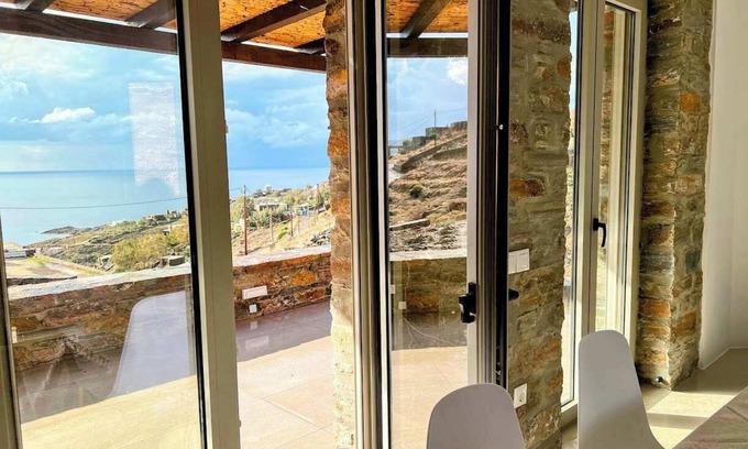 Pisses Apartamento | Experience Authentic Charm at Tzia Stone Apt with a Modern Twist and Sea Views
