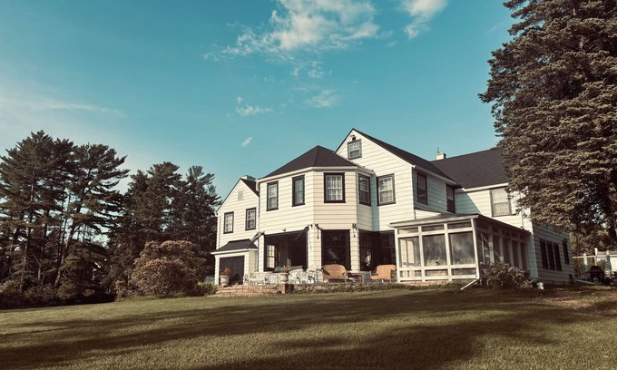 La Pointe Casa | Experience Island Estate, a grand historic home, downtown LaPointe, 9 bed 7bath