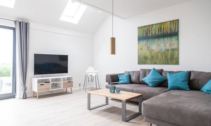 Dornum Apartamento | "Experience unforgettable vacation days in nature at Gulfhof Polder72!"