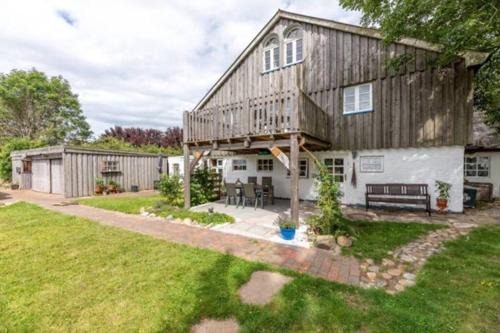 Borgsum Apartamento | Föhrzeit 2 Klein und fein mit Terrasse, friesisch gemütlich
