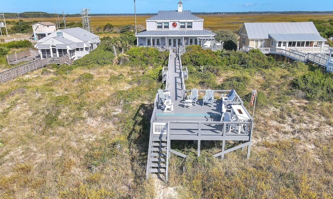 Caswell Beach Casa | Fairwinds: Invitando a la casa frente al mar, construida para entretener tanto en el interior como en el exterior