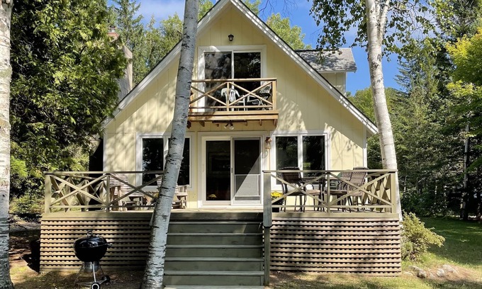 Lake Leelanau Cabaña | Fall 2025 open, stunning, cozy, sunset waterfront on N Lake Leelanau.