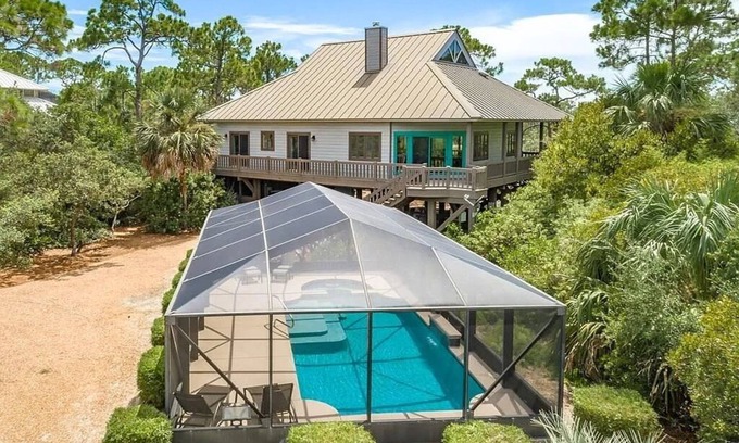 Plantation Casa | 30% OFF Summer! Canal Front, small dog ok, dock, screened private pool!