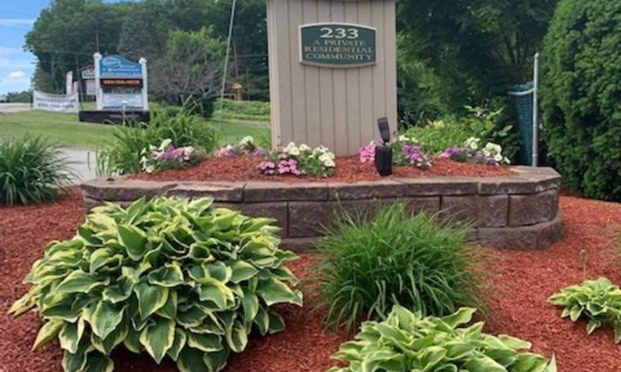 Weirs Beach Condominio | Family condo in the center for all season fun.