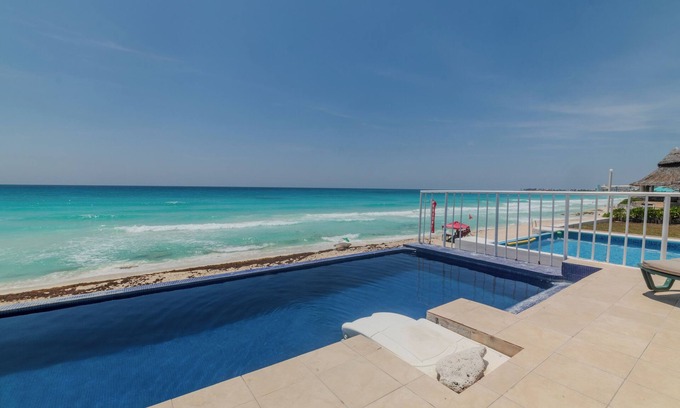Zona Hotelera Villa | Casa junto a la playa con piscina privada climatizada