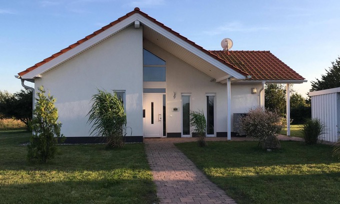 Trent Casa | Villa familiar: paraíso para niños, jardín de invierno, vacaciones en Rügen con perro