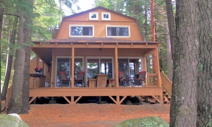 Belgrade Casa | Famous cottage directly on 100' private shoreline of pristine lake.