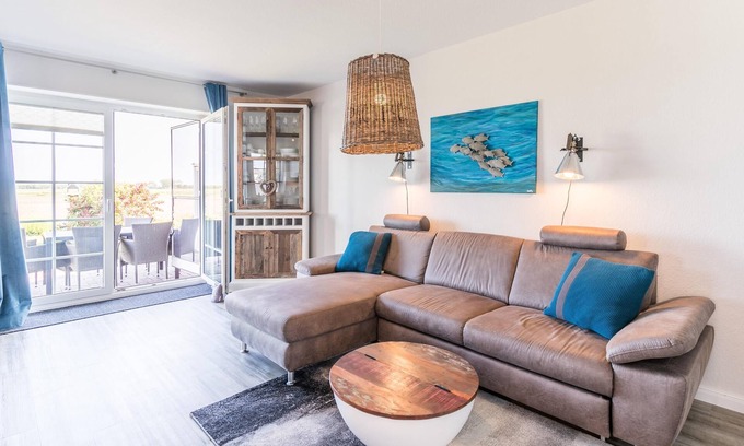 Westerdeichstrich Apartamento | "Favorite place": Modern, rural vacation apartment with a beautiful terrace