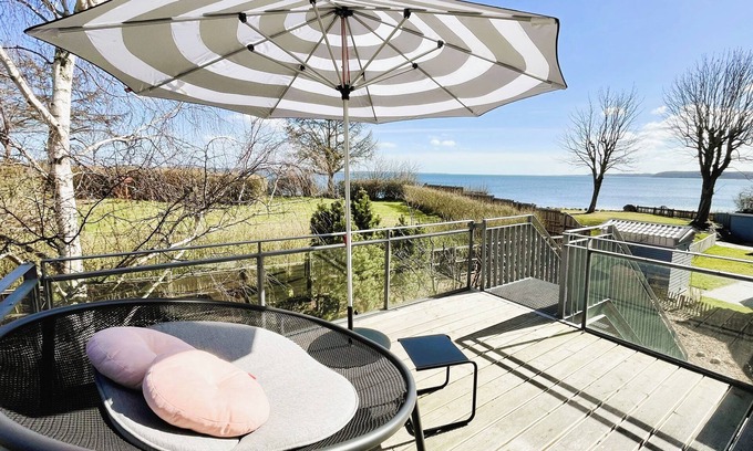 Bockholm Casa | Favorite place by the sea - Holiday home Haifischsieben with sea view, fireplace and sauna