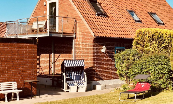 Wulfen Apartamento | Fehmarn - beach at 500m, modern apartment, enclosed Garden, balcony, sea view, dog