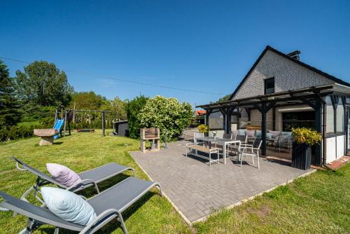 Zirkow Apartamento | Ferienhaus Landlust - Erholung mit Fasssauna und Whirlpool nahe Binz!