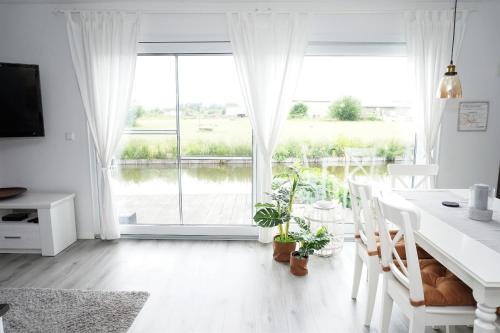 Onderdijk Casa | Ferienhaus Max am Wasser Ferienpark Vislust