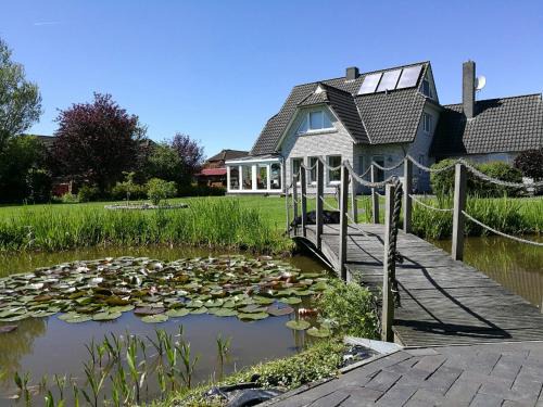 Moorhusen Casa | Ferienhaus Ossi