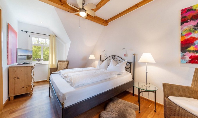Zudar Casa | Ferienhaus Rügenbrise mit Seeblick direkt am Wasser