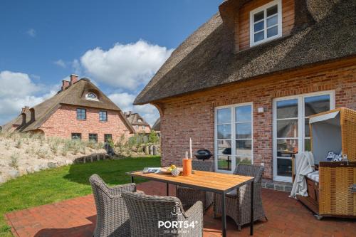 Ellenberg Casa | Ferienhaus Reetlodge auf den Schleiterrassen Kappeln