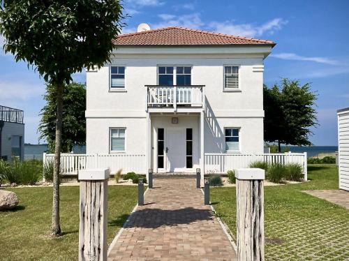 Olpenitz Casa | Ferienhaus-Sliminde-by-Seeblick-Ferien-direkte-Wasserlage-E-Ladesaeule-Sauna