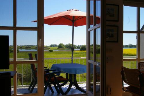 Zudar Apartamento | Ferienwohnung Boddenblick