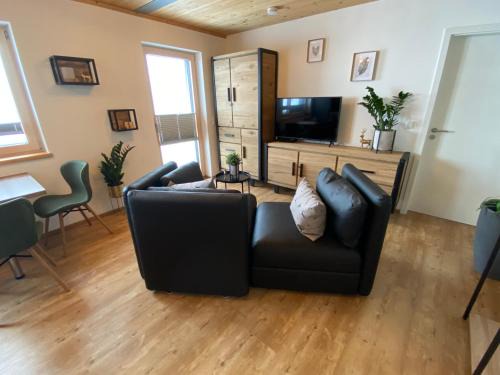 Oy Apartamento | Ferienwohnung mit eigenem Garten und Bergblick