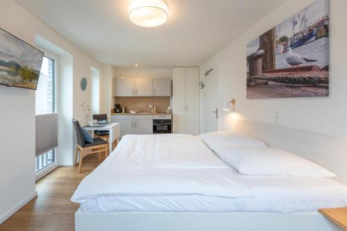 Norderhafen Apartamento | Ferienwohnung Nord-West - direkt am Nordseedeich mit Blick auf den See