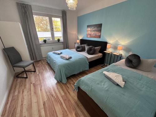 Sudstadt Apartamento | Ferienwohnung NORDLICHT mit Balkon und Smart-TV