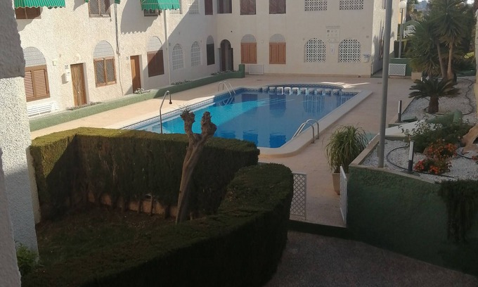 Puerto de Mazarrón Apartamento | First floor apartment with swimming pool in a quiet residential area.
